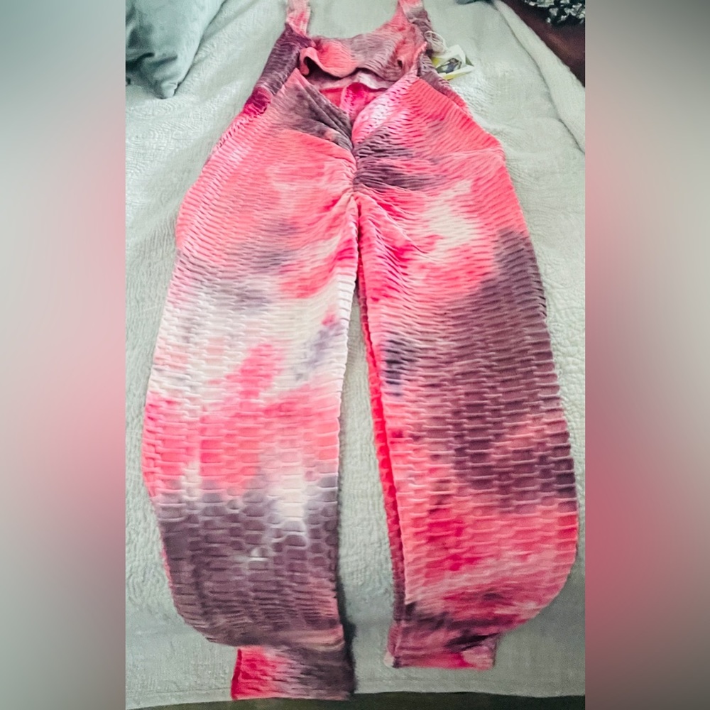 Pink color jumpsuit size L perfect for working out